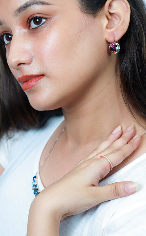 Crystal cluster leverback earring on model, white top, colorful crystal