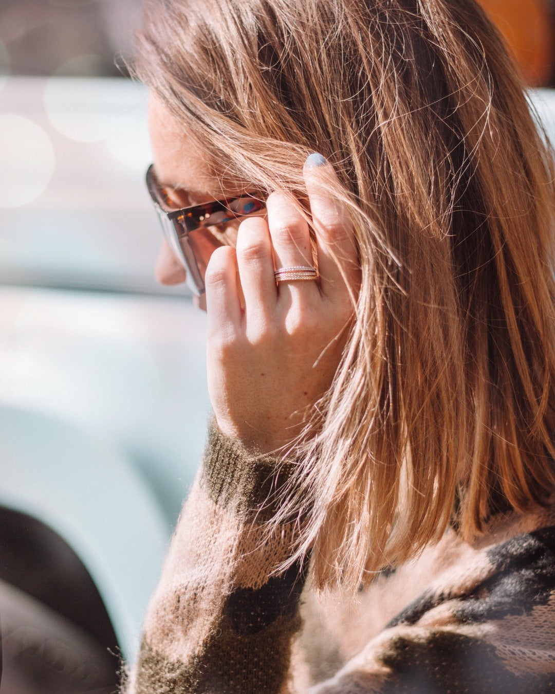 Influencer Sarah Brown wearing Upsera stacked eternity rings closeup